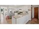 Well-lit kitchen featuring stainless steel appliances and white cabinets at 1495 Oak Springs Dr, Marietta, GA 30066