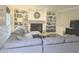 Comfortable living room with a fireplace and built-in bookshelves at 1495 Oak Springs Dr, Marietta, GA 30066