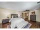 Well decorated main bedroom featuring a plush bed, ceiling fan and stylish decor at 1690 Trotters Ln, Stone Mountain, GA 30087