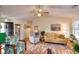 Cozy living room featuring hardwood floors, comfortable seating, and neutral paint colors at 2465 Planters Cove Cir, Lawrenceville, GA 30044