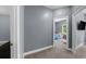 This carpeted bedroom offers ample natural light and a serene ambiance, perfect for relaxation and restful sleep at 5640 Rolling Oaks Dr, Cumming, GA 30040