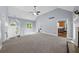 Another angle of the living room showing a vaulted ceiling and doorway to another room at 5640 Rolling Oaks Dr, Cumming, GA 30040