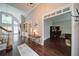 Inviting foyer with hardwood floors, high ceilings, and an open view to living spaces at 4645 Waterford Dr, Suwanee, GA 30024