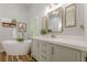 Bright main bathroom featuring a soaking tub, quartz countertop, and modern fixtures at 7045 Grand View Way, Suwanee, GA 30024