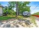 Beautiful backyard with mature trees and an RV at 1357 Railroad Ave, Sugar Hill, GA 30518