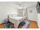 Cozy bedroom featuring a comfortable bed, soft colors, and ample natural light at 1357 Railroad Ave, Sugar Hill, GA 30518