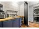 Kitchenette features a sink, butcher block countertop, and stainless steel appliances at 1357 Railroad Ave, Sugar Hill, GA 30518