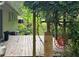 Backyard deck with lush greenery and unique sun decoration at 3291 Shady Oak Dr, Atlanta, GA 30340
