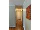 Hallway featuring hardwood floors and neutral colored walls at 3291 Shady Oak Dr, Atlanta, GA 30340