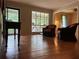 Cozy living room with hardwood floors and large windows providing plenty of natural light at 3291 Shady Oak Dr, Atlanta, GA 30340