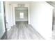 Bright foyer with hardwood floors and staircase at 3855 Saddle Bag Ct, Dacula, GA 30019