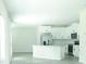Bright kitchen features white cabinets, stainless steel appliances, and center island at 3855 Saddle Bag Ct, Dacula, GA 30019