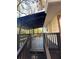 View of the home's back deck, featuring an outdoor bench and wooden flooring with overhead roof structure at 4510 Burks Rd, Forest Park, GA 30297