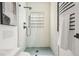 Modern bathroom featuring stylish fixtures, a glass-enclosed shower with tile surround, and a sleek design at 570 Martina Ne Dr, Atlanta, GA 30305