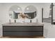 Bathroom featuring dual sinks, modern fixtures, and elegant decor and accents at 570 Martina Ne Dr, Atlanta, GA 30305