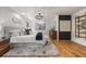 Bedroom with area rug, modern furniture, stylish shelving, and sleek decorative accents at 570 Martina Ne Dr, Atlanta, GA 30305