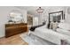 Spacious bedroom featuring a large mirror, stylish dresser, and elegant decor at 570 Martina Ne Dr, Atlanta, GA 30305