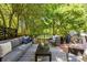 Stylish outdoor deck featuring comfortable seating and lush greenery, perfect for relaxation at 570 Martina Ne Dr, Atlanta, GA 30305