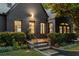 Charming brick home with updated windows and a well-maintained front yard at 570 Martina Ne Dr, Atlanta, GA 30305