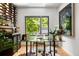 Home office featuring modern decor, wine storage, and an open view to the backyard at 570 Martina Ne Dr, Atlanta, GA 30305