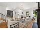 Spacious living room with hardwood floors, fireplace, and open layout at 570 Martina Ne Dr, Atlanta, GA 30305