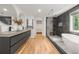 This spacious bathroom has double sinks, a modern shower, and a luxurious soaking tub at 570 Martina Ne Dr, Atlanta, GA 30305