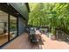 A spacious patio perfect for outdoor dining and entertaining, surrounded by lush greenery at 570 Martina Ne Dr, Atlanta, GA 30305