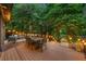 Cozy patio with ambient lighting, perfect for relaxing evenings surrounded by nature at 570 Martina Ne Dr, Atlanta, GA 30305