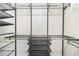 Walk-in closet with custom organizers offering shelving and drawers for storage at 6887 Slate Stone Se Way # 3, Mableton, GA 30126