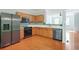Modern kitchen features stainless steel appliances and beautiful countertops at 6887 Slate Stone Se Way # 3, Mableton, GA 30126