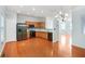 Well-lit kitchen offers stainless steel appliances and wood cabinetry at 6887 Slate Stone Se Way # 3, Mableton, GA 30126