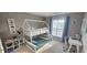 Playful bedroom featuring bunk beds, a study area, and fun decor for a creative space at 779 Avonley Creek Trce, Sugar Hill, GA 30518