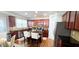 Gourmet kitchen with stainless steel appliances, granite countertops, and a central island with breakfast bar at 779 Avonley Creek Trce, Sugar Hill, GA 30518