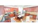 Spacious kitchen with island, stainless steel appliances, and dining area, perfect for cooking and entertaining at 779 Avonley Creek Trce, Sugar Hill, GA 30518