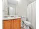 The bathroom features a vanity with wood cabinets and a tile countertop at 11072 Pebble Ridge Dr, Hampton, GA 30228