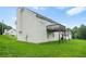 This home has a deck overlooking a grassy yard at 11072 Pebble Ridge Dr, Hampton, GA 30228