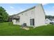 The back of the home has a walk-out deck and a sliding glass door at 11072 Pebble Ridge Dr, Hampton, GA 30228