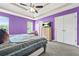 This large main bedroom features an ensuite bathroom and walk-in closets at 11072 Pebble Ridge Dr, Hampton, GA 30228