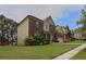 Brick home showing side of house with lovely green lawn in residential neighborhood at 1433 Sand Way, Lawrenceville, GA 30045