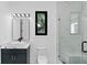 Chic bathroom with a marble shower and stylish vanity at 2709 Collins Hill Rd, Lawrenceville, GA 30043