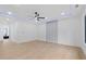 Spacious bedroom featuring a modern ceiling fan and an adjacent bathroom at 2709 Collins Hill Rd, Lawrenceville, GA 30043