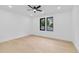 Bright bedroom with hardwood floors, recessed lighting, and a ceiling fan at 2709 Collins Hill Rd, Lawrenceville, GA 30043
