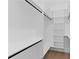 Bright, spacious closet with custom shelving and dark hanging bars at 2709 Collins Hill Rd, Lawrenceville, GA 30043