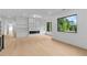 A large living room area has fireplace feature and tons of natural light at 2709 Collins Hill Rd, Lawrenceville, GA 30043