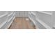 A walk-in pantry offers ample storage with custom shelving at 2709 Collins Hill Rd, Lawrenceville, GA 30043