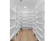 This walk-in pantry features custom shelving and lots of storage space at 2709 Collins Hill Rd, Lawrenceville, GA 30043