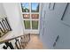 Staircase boasts views from large windows and unique wall paneling at 2709 Collins Hill Rd, Lawrenceville, GA 30043