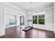 Versatile room that could be used as office featuring neutral paint, chair rail and a large window at 3259 Ivy Crossing Dr, Buford, GA 30519