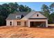 Charming single-story home with white siding and a spacious two-car garage at 610 Presley Farm Pkwy, Rockmart, GA 30153