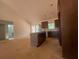 Kitchen area showcasing modern cabinets and an island at 610 Presley Farm Pkwy, Rockmart, GA 30153